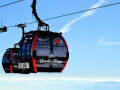 Kolejką na Łomnicę. Bilety online na Tatry Wysokie. Widok na góry z gondoli.